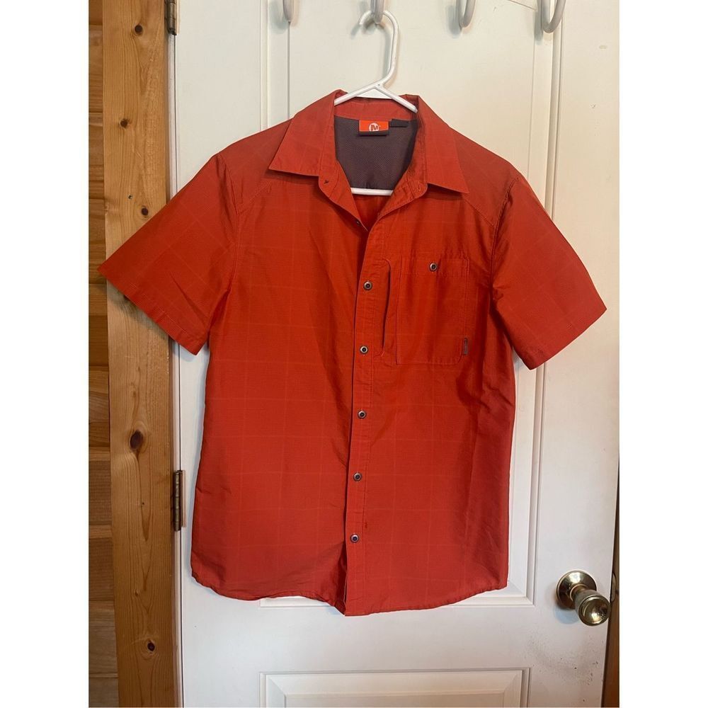 Merrell mens shirt size S button up burnt orange in color, button front pocket